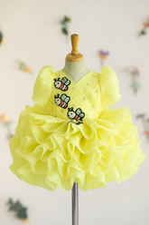 Fluffy yellow dress with bees